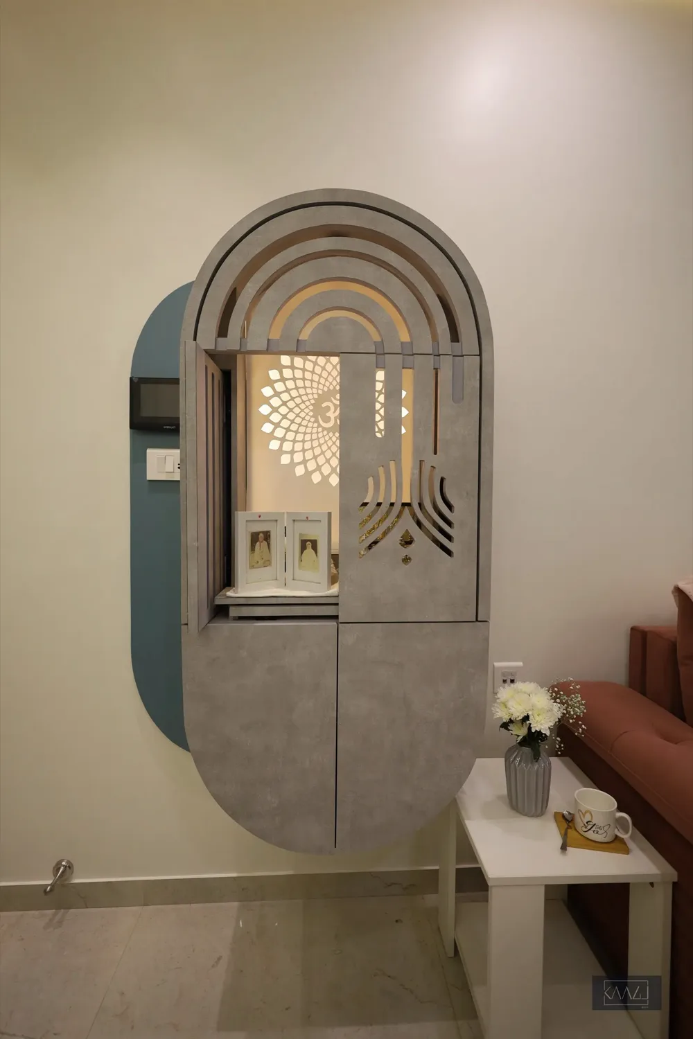 Modern mandir door design and the lighting behind it